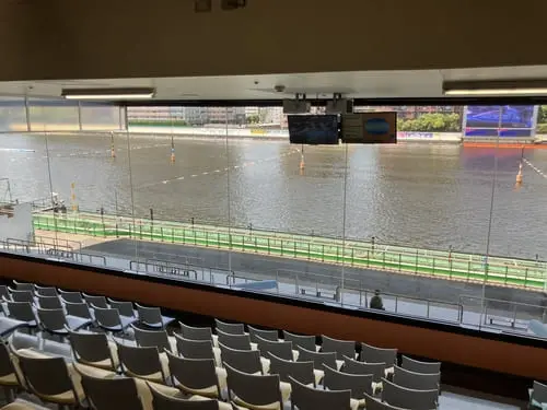 View of the boat race course from the 3rd-floor general grandstands at BOAT RACE Heiwajima, with rows of indoor seating.