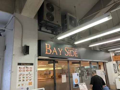 BAY SIDE, one of the food stalls at BOAT RACE Heiwajima, offering snacks and meals on the first floor.